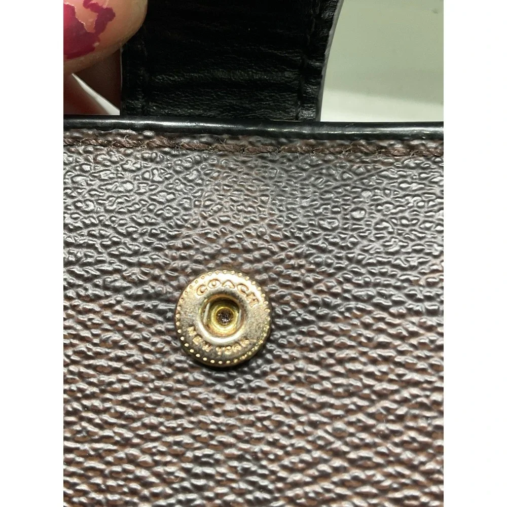 Coach signature one
